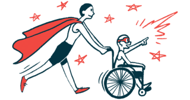 A boy in a wheelchair wearing goggles is being pushed along by a man wearing a cape.