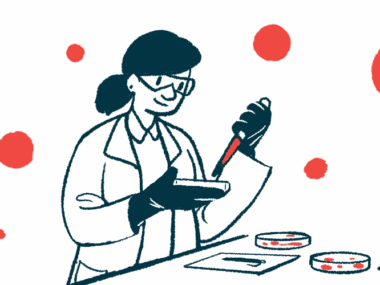 A researcher does lab work with vials stacked in front of her.