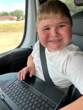 living with duchenne muscular dystrophy | Muscular Dystrophy News | Betty's 11-year-old son, Charlie, sits in the family's large van with a laptop on his lap. He is strapped in with a seatbelt, and wearing the broadest smile imaginable. 