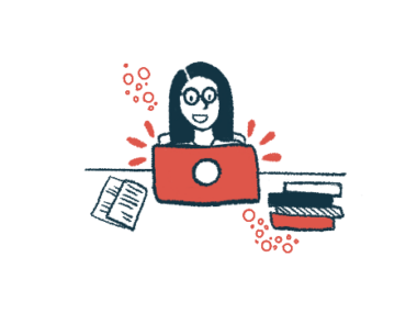 A woman is working with a computer at a desk that also has books and papers.