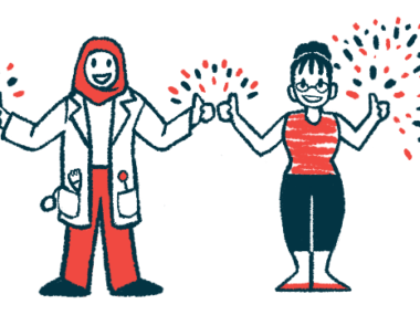 A clinician and another person stand side by side, flashing a thumbs-up sign.