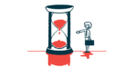 A person stands next to an hourglass as the sand runs out.