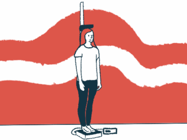 A person standing on a scale has their weight and height measured.