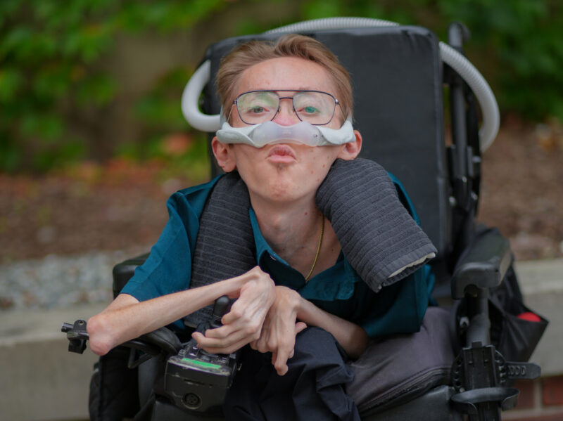 a young man with muscular dystrophy is shown.